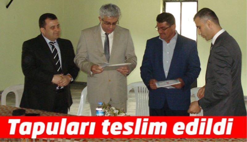 Tapuları teslim edildi 